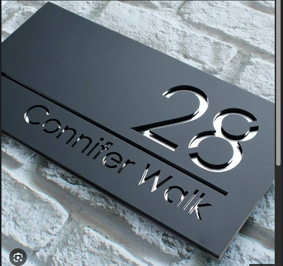 Matte charcoal rectangular house sign reading 28 Connifer Walk